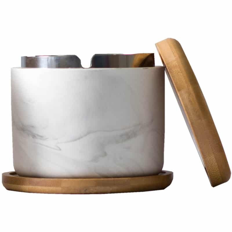 closeup large ashtray with wooden lid