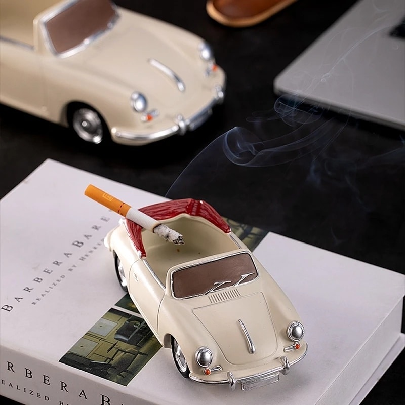 cute Oldtimer Car Ashtray on table